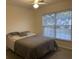 Well-lit bedroom with a window view and comfortable sleeping area at 203 Arbor Oaks Dr, Summerville, SC 29485