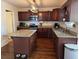 Well-equipped kitchen with granite countertops, stainless steel appliances, and ample cabinet space at 203 Arbor Oaks Dr, Summerville, SC 29485