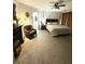 Serene main bedroom with neutral tones, carpet floors, and access to the en-suite bathroom at 203 Arbor Oaks Dr, Summerville, SC 29485