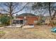 Wide view of the backyard featuring fire pit, patio, screened-in porch and playset at 2072 Middleburg Ln, Mount Pleasant, SC 29464