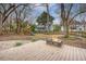 Spacious backyard featuring a fire pit, play set, and lush greenery at 2072 Middleburg Ln, Mount Pleasant, SC 29464