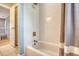 Bathroom featuring white tiled shower and bathtub with a patterned shower curtain at 2072 Middleburg Ln, Mount Pleasant, SC 29464