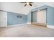 Empty bedroom with neutral carpet flooring, ceiling fan, and vaulted ceilings at 2072 Middleburg Ln, Mount Pleasant, SC 29464