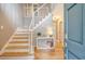 Welcoming foyer with hardwood floors and a staircase, offering a glimpse into the home's layout at 2072 Middleburg Ln, Mount Pleasant, SC 29464