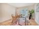 Bright home office featuring wood floors, large window, woven chairs, and a modern desk, great for remote work at 2072 Middleburg Ln, Mount Pleasant, SC 29464