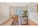 Bright home office featuring wood floors, large window, woven chairs, and a modern desk, great for remote work at 2072 Middleburg Ln, Mount Pleasant, SC 29464