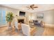 Comfortable living room boasts a fireplace, coffered ceiling, and neutral color palette at 2072 Middleburg Ln, Mount Pleasant, SC 29464