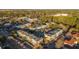 Attractive aerial view of community condos featuring colorful exteriors, lush landscaping, and convenient parking at 2200 Belle Isle Ave # 103, Mount Pleasant, SC 29464