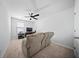 Relaxing bedroom features a ceiling fan, plush carpeting, and a comfortable seating area at 225 Sedona Dr, Summerville, SC 29486