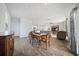 A formal dining room leading into a comfortable living area with hardwood floors at 225 Sedona Dr, Summerville, SC 29486