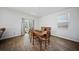 Dining area featuring hardwood floors, natural light, and access to the patio at 225 Sedona Dr, Summerville, SC 29486