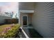 Charming front entrance with a small table, stylish door, and flowerbeds at 225 Sedona Dr, Summerville, SC 29486
