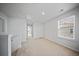 Upstairs hallway featuring neutral carpet, natural light, and multiple rooms at 225 Sedona Dr, Summerville, SC 29486