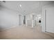 An open upstairs hallway with carpeting and access to bedrooms and storage at 225 Sedona Dr, Summerville, SC 29486
