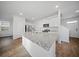Bright kitchen boasts granite countertops, stainless steel appliances, and hardwood floors at 225 Sedona Dr, Summerville, SC 29486