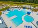 Aerial view of a community pool featuring pools, lounge chairs, and recreational spaces at 225 Sedona Dr, Summerville, SC 29486