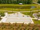 Recreation area featuring a bocce ball court, picnic tables, benches, walking paths, and landscaping at 225 Sedona Dr, Summerville, SC 29486