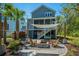 Backyard area with seating, fire pit, and outdoor shade at 2322 Dorado Ct, Johns Island, SC 29455