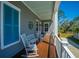 Cozy balcony furnished with rocking chairs and a tranquil view at 2322 Dorado Ct, Johns Island, SC 29455