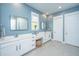 Bright bathroom featuring dual vanities, natural light, and stylish fixtures, creating a serene retreat at 2322 Dorado Ct, Johns Island, SC 29455