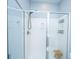 A bright bathroom highlighting a spacious glass shower, convenient seating, and white tile at 2322 Dorado Ct, Johns Island, SC 29455