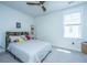 Serene bedroom with white walls, a cozy bed with stuffed animals, and a bright window with natural light at 2322 Dorado Ct, Johns Island, SC 29455