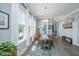 Bright dining room with decorative lighting and large windows at 2322 Dorado Ct, Johns Island, SC 29455