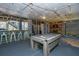Spacious game room with a pool table, bar, and dartboard for entertainment at 2322 Dorado Ct, Johns Island, SC 29455