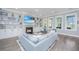 Cozy living room with a fireplace, built-in shelves, and comfortable seating area at 2322 Dorado Ct, Johns Island, SC 29455