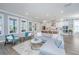 Open concept living space with views of the kitchen, fireplace, and comfortable seating at 2322 Dorado Ct, Johns Island, SC 29455