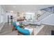 Spacious living space with a modern kitchen, inviting seating, and open floor plan at 2322 Dorado Ct, Johns Island, SC 29455