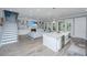 Spacious living space with a kitchen island, fireplace, and seamless flow throughout at 2322 Dorado Ct, Johns Island, SC 29455