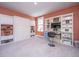 Inviting home office with built-in bookcases, a Murphy bed, and a comfortable workspace at 2322 Dorado Ct, Johns Island, SC 29455