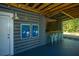 Fun outdoor bar and game area with plenty of seating and games for entertaining at 2322 Dorado Ct, Johns Island, SC 29455