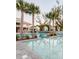 Community pool with surrounding landscape and buildings providing a relaxing atmosphere at 2322 Dorado Ct, Johns Island, SC 29455