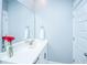 Bright powder room with a white vanity and neutral color scheme at 2322 Dorado Ct, Johns Island, SC 29455