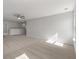 Bright bonus room showcases neutral carpeting and ample space, creating a serene atmosphere for relaxation and entertainment at 234 Silk Oak Dr, Moncks Corner, SC 29461