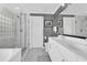 Elegant bathroom boasts double sinks, sleek cabinets, glass shower, and modern bathtub at 2353 Eagle Creek Dr, Charleston, SC 29414