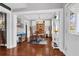 Elegant dining room featuring modern lighting, hardwood floors, and a cozy ambiance at 2353 Eagle Creek Dr, Charleston, SC 29414