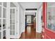 Inviting foyer with hardwood floors, French doors, and a warm, welcoming atmosphere at 2353 Eagle Creek Dr, Charleston, SC 29414