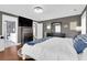 Comfortable primary bedroom features a walk-in closet, ensuite bath, and calming colors at 2353 Eagle Creek Dr, Charleston, SC 29414
