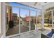 Bright screened porch with sliding glass doors overlooking a backyard deck at 2353 Eagle Creek Dr, Charleston, SC 29414