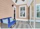 Relaxing sunroom boasts natural light, comfortable seating, and stylish floors for peaceful enjoyment at 2353 Eagle Creek Dr, Charleston, SC 29414