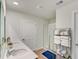 Bright, stylish bathroom featuring double sinks, large mirror, and glass shower at 243 N Light Way, Summerville, SC 29486