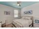 Cozy bedroom with a light blue ceiling and walls, carpet, and an abundance of natural light at 243 N Light Way, Summerville, SC 29486