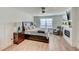 Spacious main bedroom with a fireplace, sitting area, and warm lighting from bedside lamps at 243 N Light Way, Summerville, SC 29486