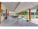 Relaxing covered patio featuring hammocks and spacious layout, ideal for enjoying the outdoors at 243 N Light Way, Summerville, SC 29486