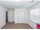 Bright bedroom features neutral carpet and view to the bedroom closet at 2431 Thoreau Ln, Charleston, SC 29406