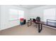 Bright bedroom features neutral carpet, large windows, and ample space for work or relaxation at 2431 Thoreau Ln, Charleston, SC 29406