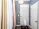 Entryway featuring wood floors and a stylish door with a 'Blessed' welcome mat at 2431 Thoreau Ln, Charleston, SC 29406
